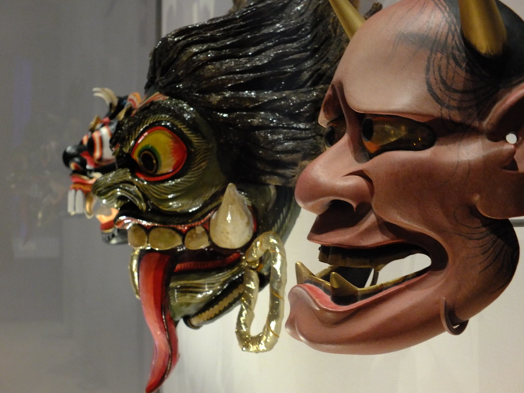 Three traditional Japanese masks include a reddish horned Hannya and a green demon with red tongue. — illustrating “Anatomicals Face & Hair Mask Review” on Florence and Mary