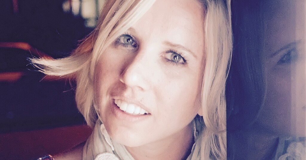 A warm close-up of a smiling blonde woman with blue eyes shows a soft facial reflection on the right. — illustrating “BEDM: Introduce yourself in 5 lines” on Florence and Mary