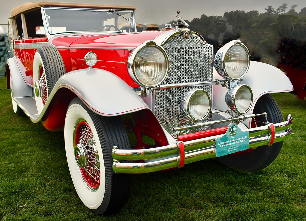 A vintage red Packard convertible with silver fenders and white-wall tires is parked on a green lawn. — illustrating “Lush Brightside Bubble Bar Review” on Florence and Mary