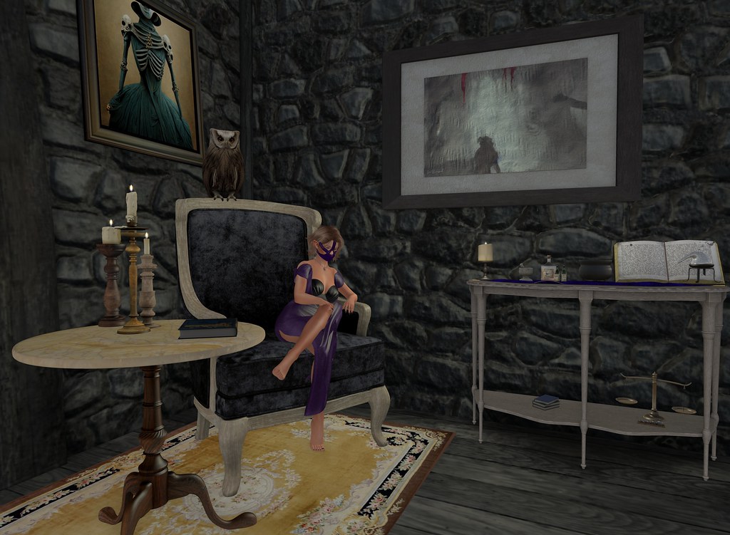 Masked woman in purple gown sits in a dark stone room with owl, candles, and alchemist tools. — illustrating “Soap & Glory Sugar Crush Giftset” on Florence and Mary