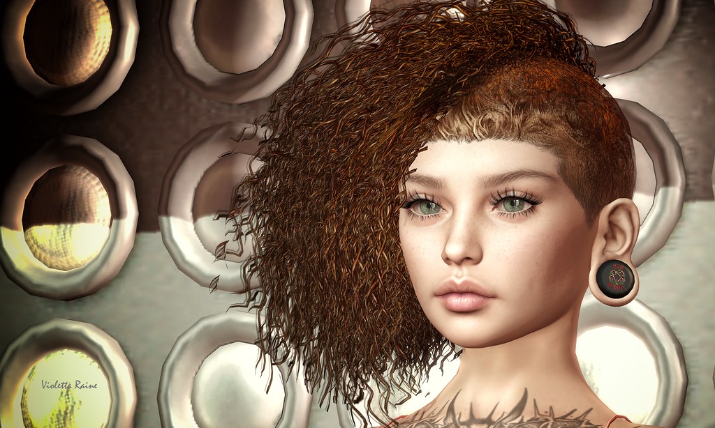 Digital portrait of curly reddish-brown hair, shaved side, and green eyes against glowing lights. — illustrating “The Beauty Blogger Tag | Part 1” on Florence and Mary